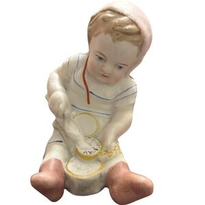 Antique Bisque Victorian Piano Baby.